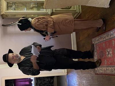 Three Feathers confers with the Judge